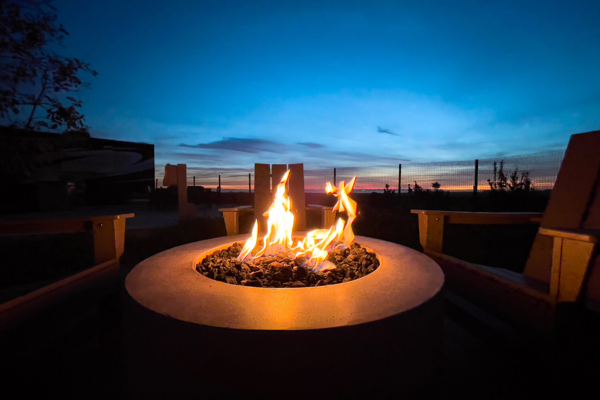 a fire pit with a fire in it