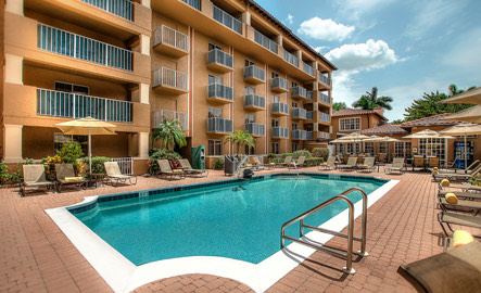 a pool in front of a building