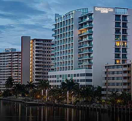 Exterior of residence inn hotel entrance at dusk