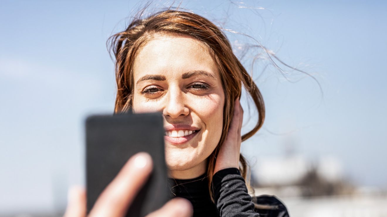 Girl with her phone in hand