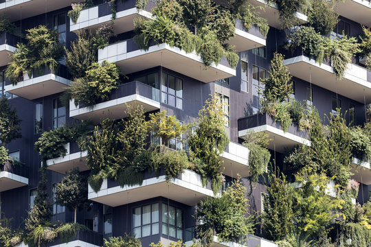 Green futuristic skyscraper; architecture and nature relationship