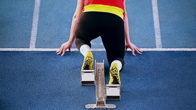 Athlete at the starting block in the track and field competition