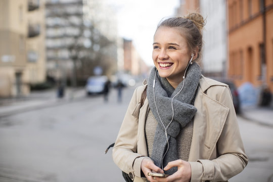 Teenage girl using cell phone