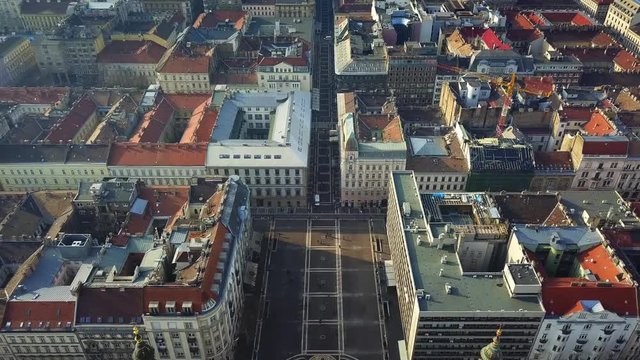 Budapest, Hungary - 4K aerial footage of drone flying over of beautiful St.Stephen's Basilica towards River Danube with Chain Bridge