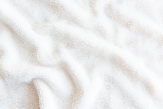 White delicate soft  background of plush fabric