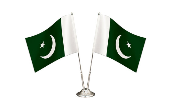 Pakistan table flag isolated on white ground. Two flag poles with flags and Pakistan flag on the table.