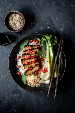 Tempeh with rice and pak choi - Vegan food