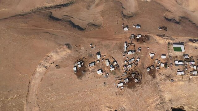 Bedouin camp Isolated in Judaean desert Aerial view
Drone footage over Bedouin outpost Close to Israeli City Maale Adumim Aerial, Israel
