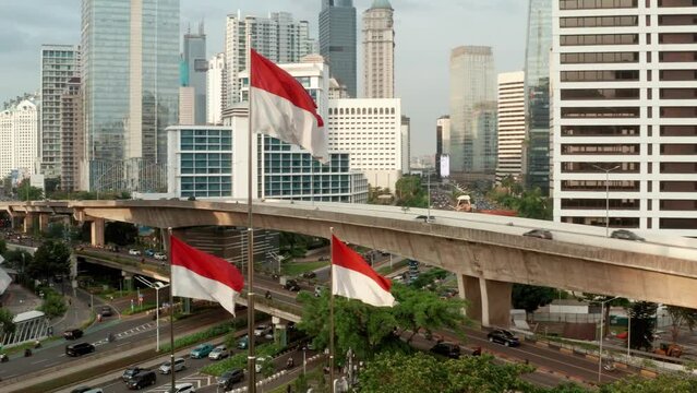 Drone Shot Orbiting Indonesian Flags In Downtown Jakarta