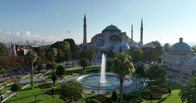 Istanbul, Turkey. Sultanahmet area with the Blue Mosque and the Hagia Sophia with a Golden Horn and Bosphorus bridge in the background at sunrise.