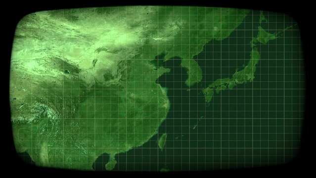 Viewing on a CRT monitor (green phosphors): satellite capture of the Far East (Japan, Korea, China, India), and zooming out. Surveillance, global communications.
