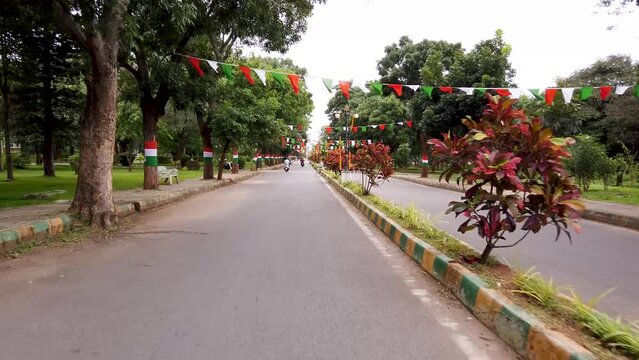 A Dramatic scene of a  street decorated with colorful tricolor flags for the Indian Independence day celebration at Mysore in Karnataka, India.