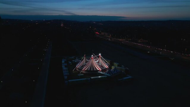 Aerial view of a circus tent in Prague during blue hour