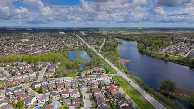 Aerial footage of a highway serving as a lifeline between twin lakes.