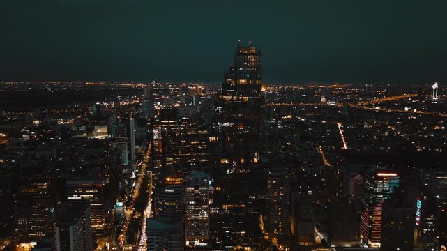 Skyscraper in the night city, drone footage