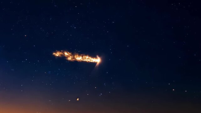 Captivating footage of a meteors trail with fiery fragments breaking off and fizzling in its wake.