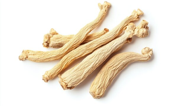 Cluster of dried ginseng roots isolated on a white background, photographed from above. The clean and minimalist setup emphasizes the natural contours.