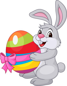 Cute rabbit carftoon holding easter egg