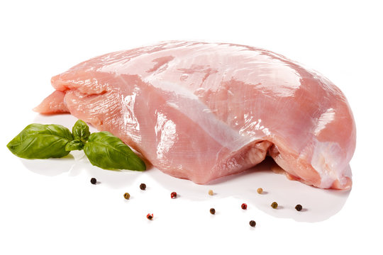 Raw turkey fillet on white background