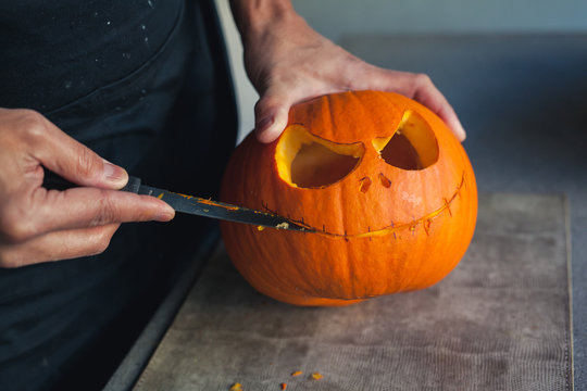 Carving a pumpkin for halloween