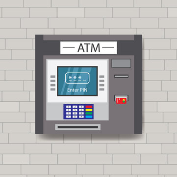 ATM machine on a brick wall