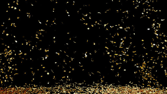 A fountain of golden confetti falling on the floor on an black background