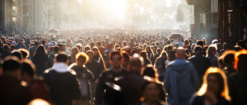 Blurred crowd of unrecognizable at the street