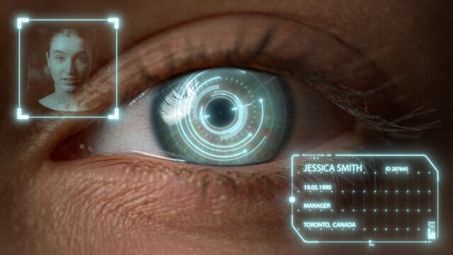 Closeup eye biometrics recognition system checking user analyzing personality 