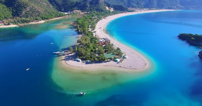 mediterranean bays and beach blue water sky drone footage aerial green pine trees oludeniz blue lagoon famous fethiye oludeniz turkey fethiye above