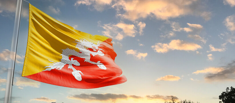 Bhutan national flag cloth fabric waving on the sky - Image