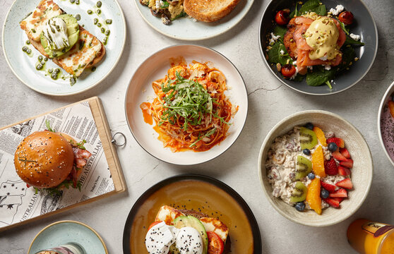 Various food dishes on table