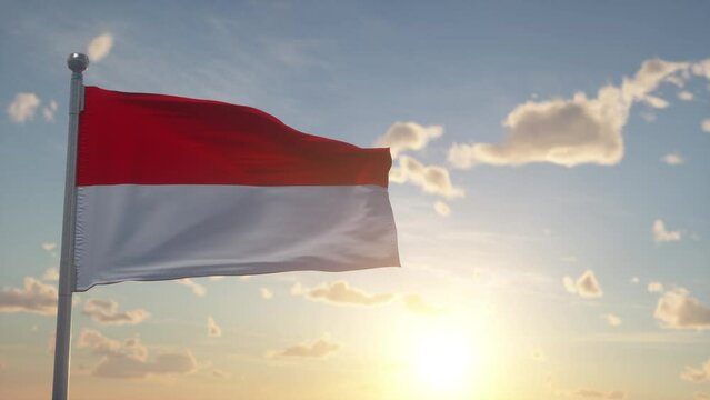 Indonesian flag waving in the wind. National flag of Indonesia