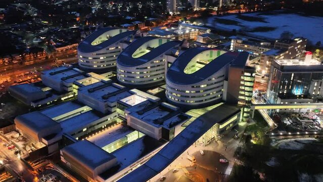 drone footage of queen Elisabeth hospital at twilight