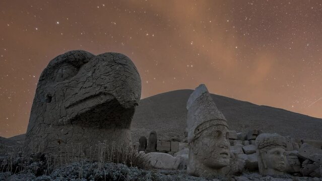 Nemrut Mountain night time lapse statue heads and stars in the background moving