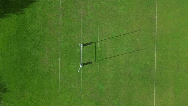 Aerial shot of rugby field with surrounding track.