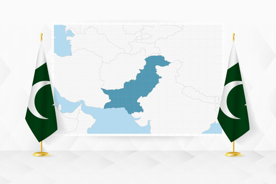 Map of Pakistan and flags of Pakistan on flag stand.