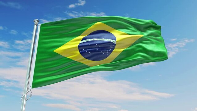 Closeup National Flag of the Brazil  Waving in the Wind, Under the Blue Sky