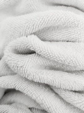 White towel texture. Close-up white towel. White background