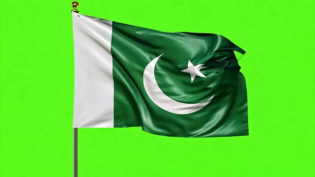 Pakistan national flag waving in the wind in slow motion against a chroma key green screen.