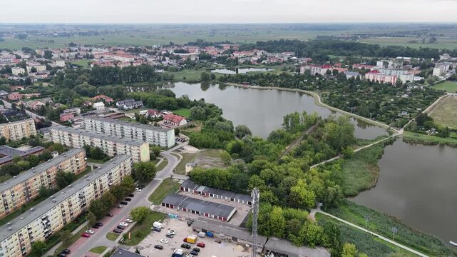 aerial footage of lake in the center of a city