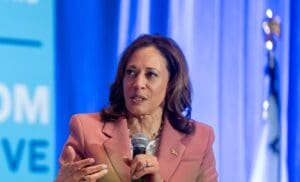 Kamala Harris unrealized capital gains tax proposal billionaire minimum tax