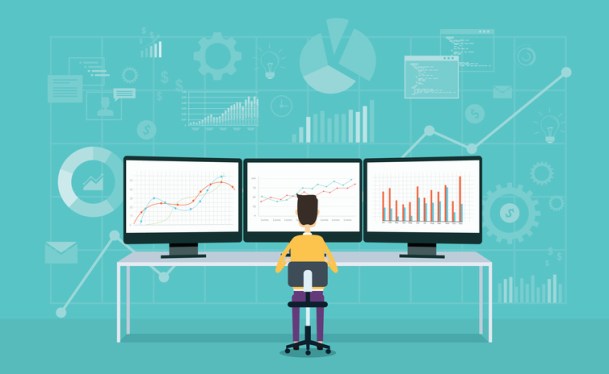 illustration of person sitting in front of three large monitors