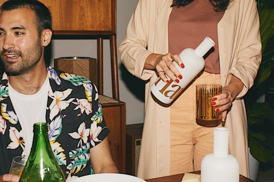 woman pouring wine