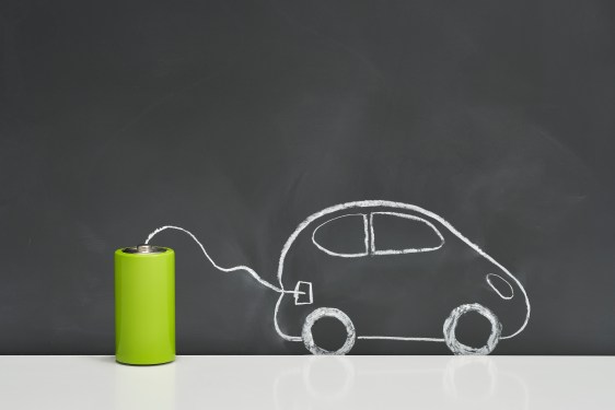 Batteries and electric vehicles on a blackboard