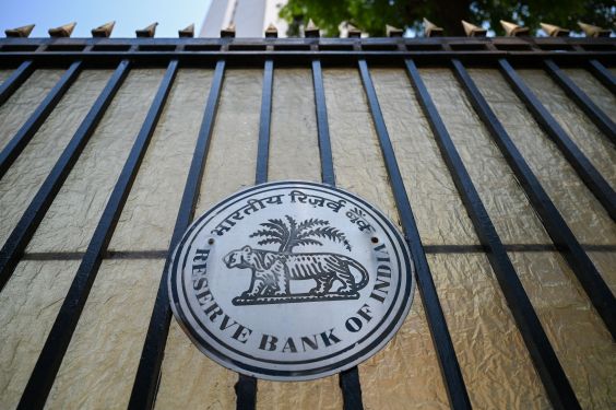 The logo of the Reserve Bank of India (RBI) is pictured on the gate of the bank's headquarters in Mumbai.