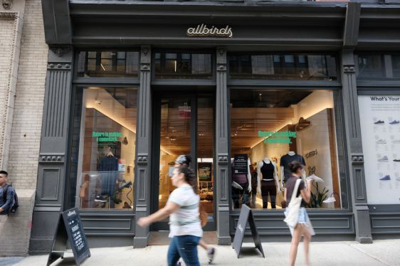 NEW YORK, NEW YORK - AUGUST 31: People walk past an Allbirds store, a maker of sustainable shoes, in lower Manhattan on August 31, 2021 in New York City. The shoe company has announced that it is preparing an initial public offering (IPO). The company has lost money and expects it will continue to be unprofitable for the foreseeable future. (Photo by Spencer Platt/Getty Images)