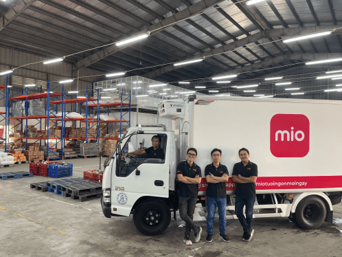 Mio's founding team at one of the social commerce startup's grocery warehouses in Vietnam