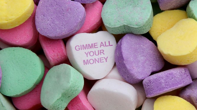 Valentine hearts with one having text saying. "Gimme all your money"