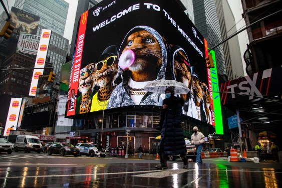 An advertisement for Big Cats non-fungible token (NFT) on an electronic billboard in Times Square on Friday, Jan. 28, 2022.