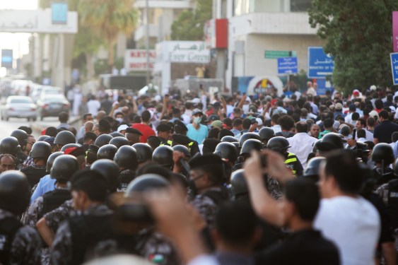 A photo of Jordanian protesters on the streets in support of the teacher's union, an opposition-run union that became a force for political dissent.